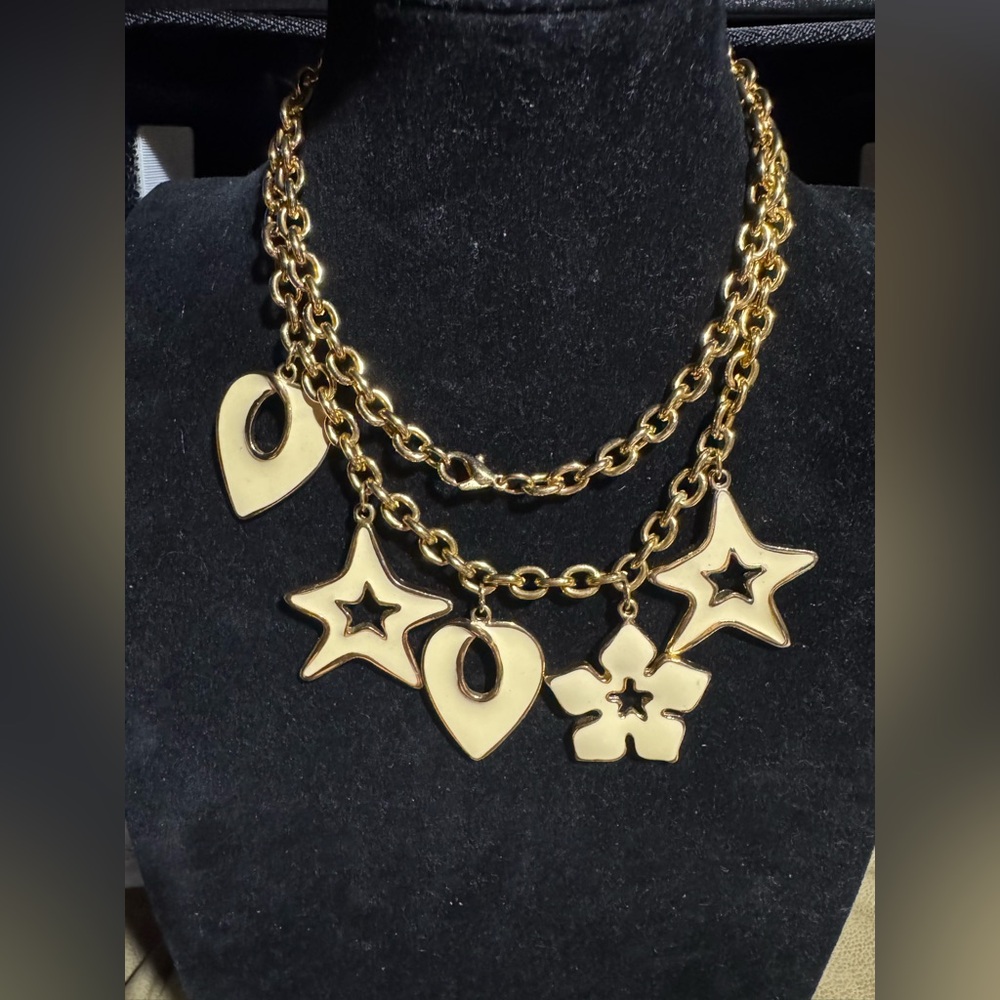 Gold tone necklace with cream enamel charms era 70s -80s 20”L
